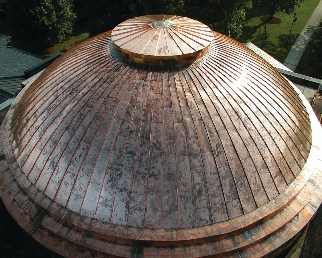 Craftsman Roofing crew installing a new roof in East Side Commercial Area